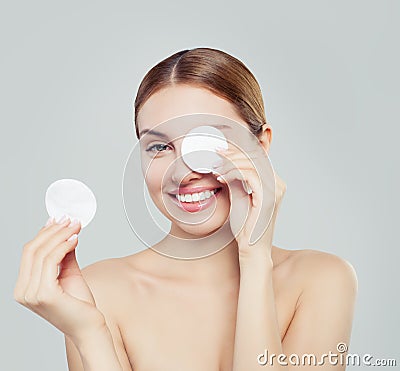 Cotton pad woman face, cosmetology and remover makeup. Stock Photo