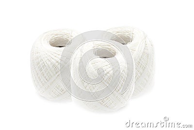 Cotton thread balls on white background Stock Photo