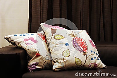 Couch with patterned cushions Stock Photo