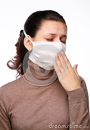 Coughing woman in a medical mask Stock Photo