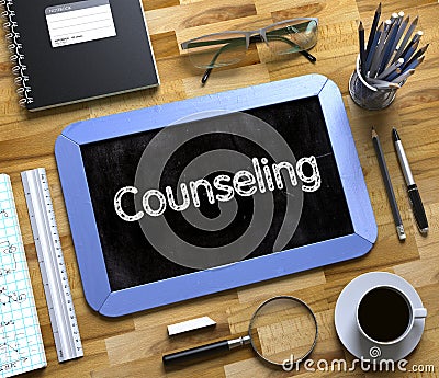 Counseling Handwritten on Small Chalkboard. 3D. Stock Photo