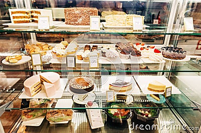 Counter with different kind of cakes Stock Photo