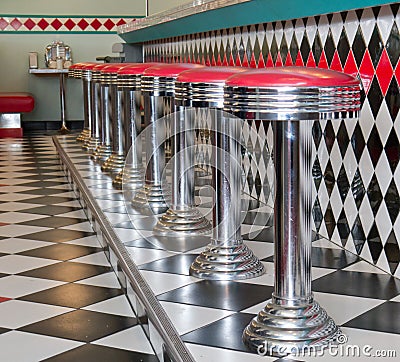 Counter Stools in a row at a 50's style diner Stock Photo