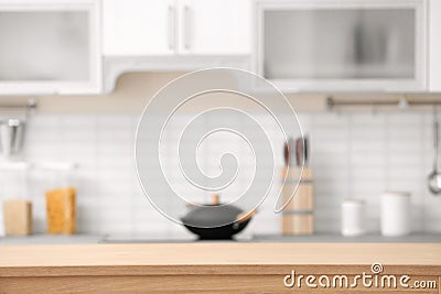 Countertop and blurred view of kitchen interior Stock Photo