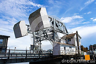 Counterweights of the Mystic River Bascule Bridge while it is closed so traffic can pass as seen from the side Mystic Conneticut U Editorial Stock Photo