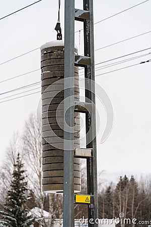 Counterweights for railway overhead electric wires Stock Photo