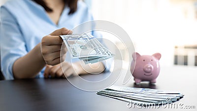 Counting money, businessmen have analyzed between cash and credit card which is consistent and convenient to spend in the present Stock Photo