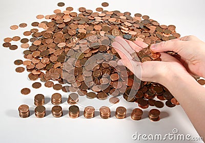 Counting Pennies Stock Photo