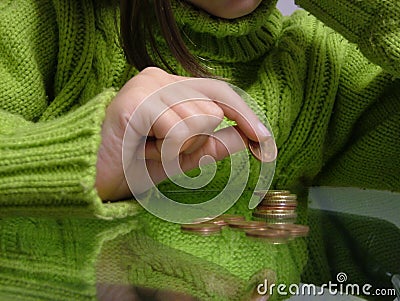 Counting Pennies Stock Photo