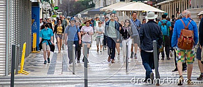countless people walking around on a sunny day in a street in the center of Lisbon Editorial Stock Photo