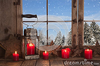 Country Christmas decoration: wooden window decorated with red c Stock Photo