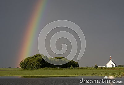 Country Church and Rainbow Stock Photo