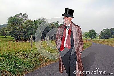 Country gent walking home Stock Photo