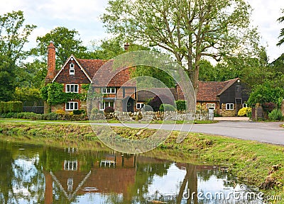 Country house with pond Stock Photo