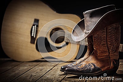 Country music festival live concert with acoustic guitar, cowboy hat and boots Stock Photo