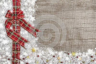 Country style christmas background with red green checked ribbon Stock Photo