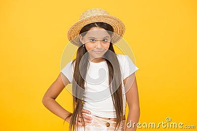 Country style. small beauty. happy kid on yellow background. she love summer vacation. spring fashion for kids Stock Photo