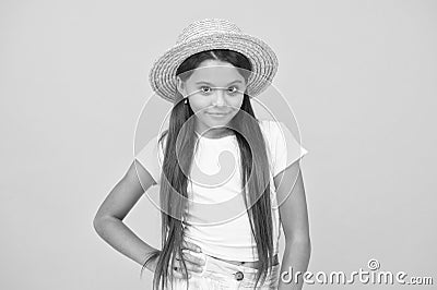 Country style. small beauty. happy kid on yellow background. she love summer vacation. spring fashion for kids Stock Photo