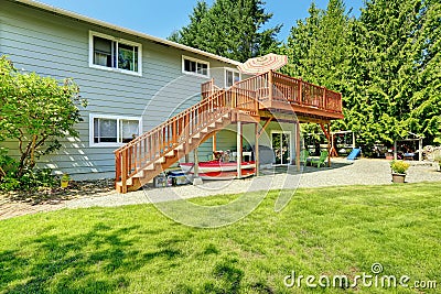 Countryside house with wooden walkout deck Stock Photo