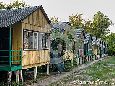 Countryside place for recreation and day off. row of small multi colored houses Stock Photo