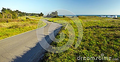 Countryside road along Yeu island costline Stock Photo