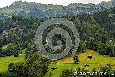 Countryside view and farmland of Lauterbrunnen village in Switzerland Stock Photo