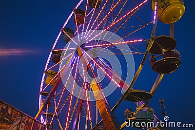 County Fair at night Ferris Wheel on the Midway Editorial Stock Photo