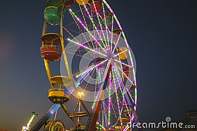 County Fair at night Ferris Wheel on the Midway Stock Photo