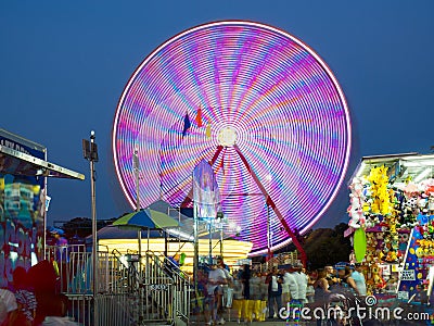 County Fair ride, at night, in motion. Gwinnett County, GA. Editorial Stock Photo
