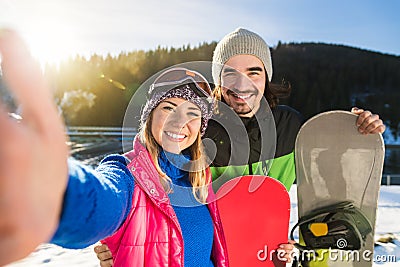 Coupe Ski And Snowboard Resort Taking Selfie Photo Winter Snow Mountain Man Woman Stock Photo