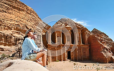 Couple in Ad Deir the Monastery Temple in Petra, Jordan Stock Photo