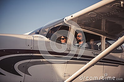 Couple in aircraft Stock Photo