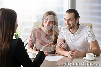 Couple applying for mortgage, taking bank loan to buy property Stock Photo