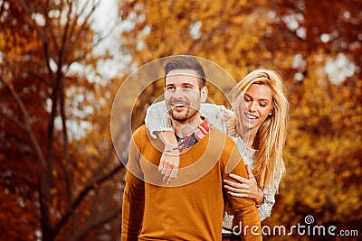 Couple in the autumn park Stock Photo