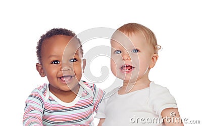 Couple of Babies African and Caucasian laughing Stock Photo