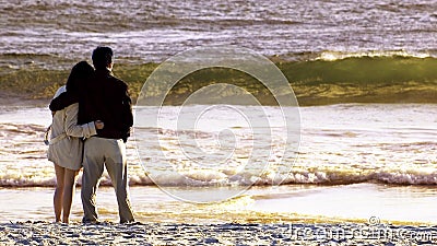 Couple in the beach Stock Photo