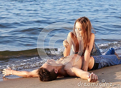 Couple at the beach Stock Photo