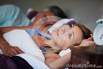 Couple In Bed With Wife Suffering From Insomnia Stock Photo