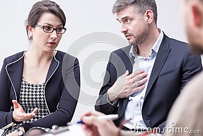 Couple blaming each other for marriage problems Stock Photo