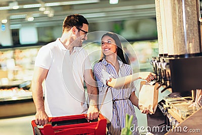 Couple bying products in zero waste shop Stock Photo