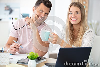 Couple at cafe reading bank contract document Stock Photo