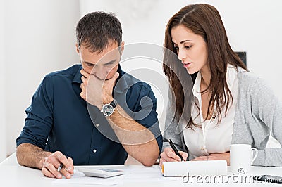 Couple Calculating Budget Stock Photo