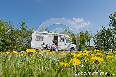 Couple with camper Stock Photo