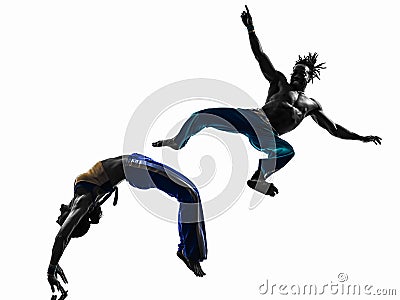 Couple capoeira dancers dancing silhouette Stock Photo