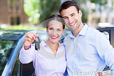 Couple with car keys Stock Photo