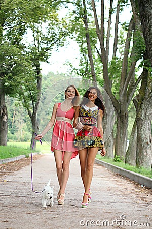 Couple cheerful girls in the street Stock Photo