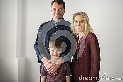 A couple with the child boy at home Stock Photo