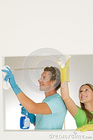 Couple cleaning Stock Photo