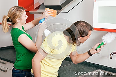 Couple cleaning apartment Stock Photo