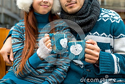 Couple with coffee cups in winter Stock Photo